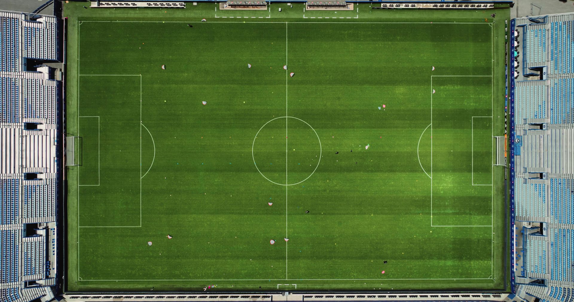 An aerial view of a soccer field in a stadium